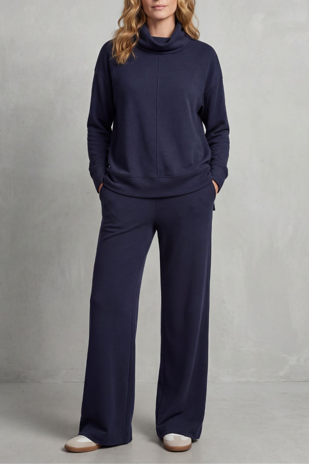 Luverra lounge set styled with neutral sneakers for a relaxed city look