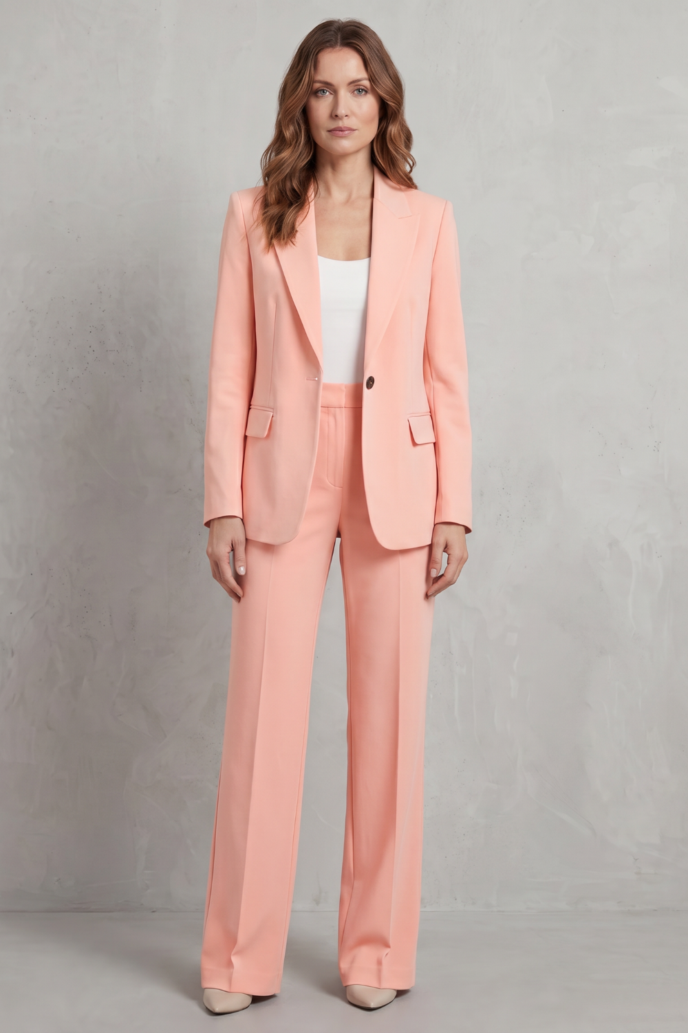 Black colorway of the tailored blazer and pants suit set, full-length view