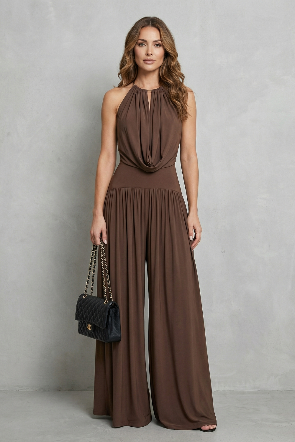 Side view of the draped halter two-piece set with high-waisted wide-leg pants