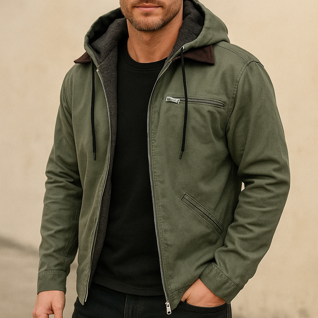 Green jacket with a hood worn by a person on a beige background