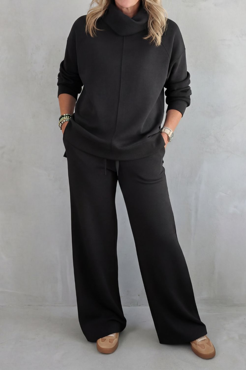 Light blue colorway of the turtleneck and wide-leg pants set, full-length view