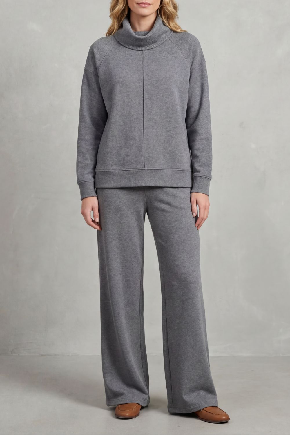 Black colorway of the draped turtleneck top and wide-leg pants lounge set