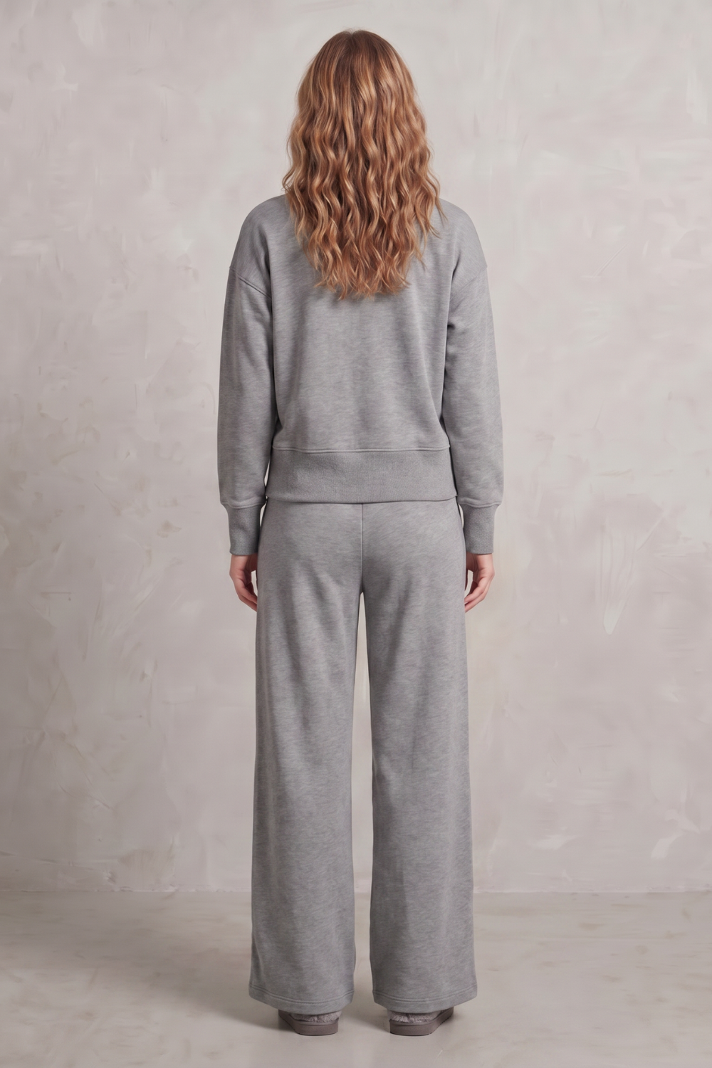 Detail close-up of the clean front seam on the wide-leg lounge pants