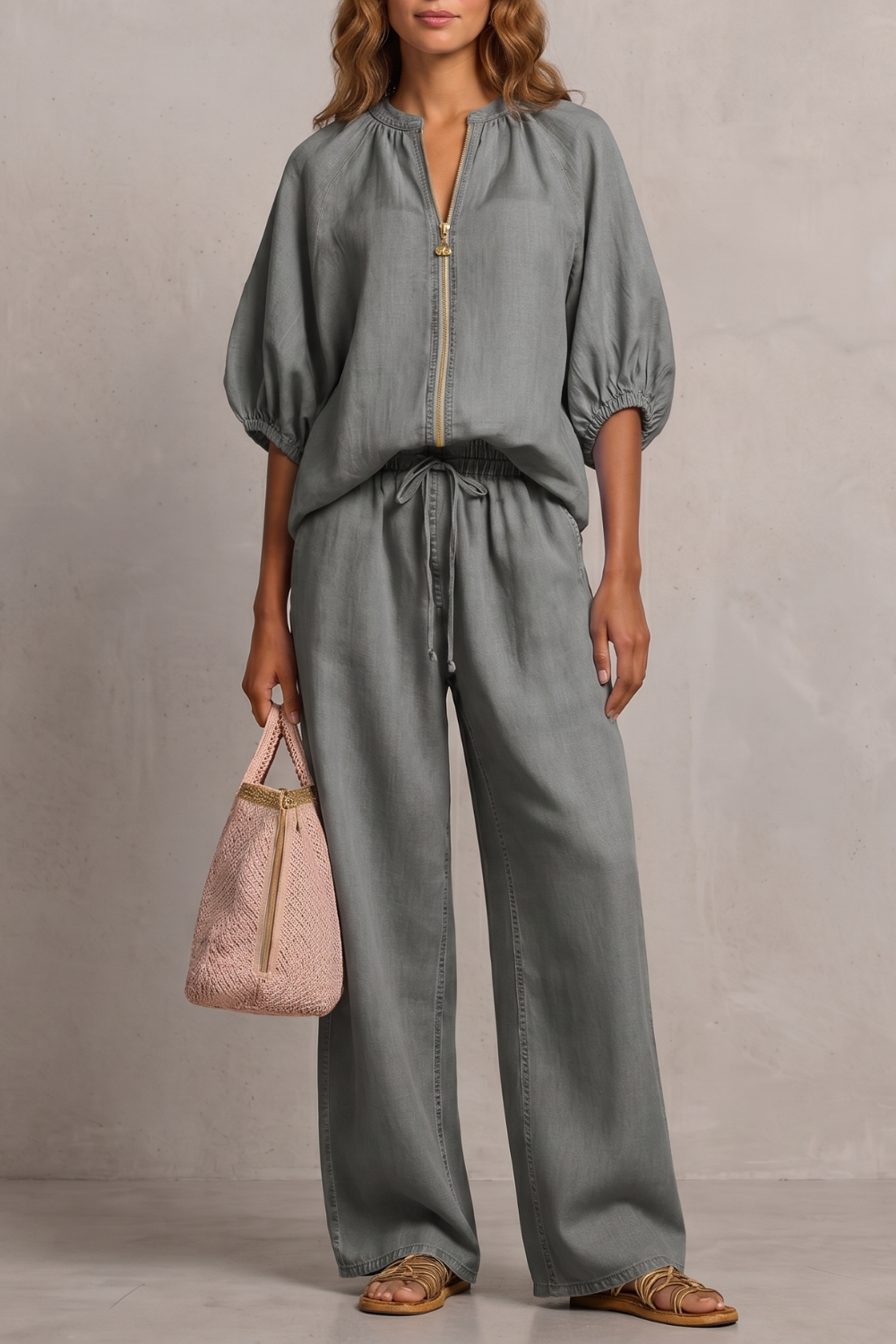 Blue colorway of the zip-front puff sleeve pants set, full-length view
