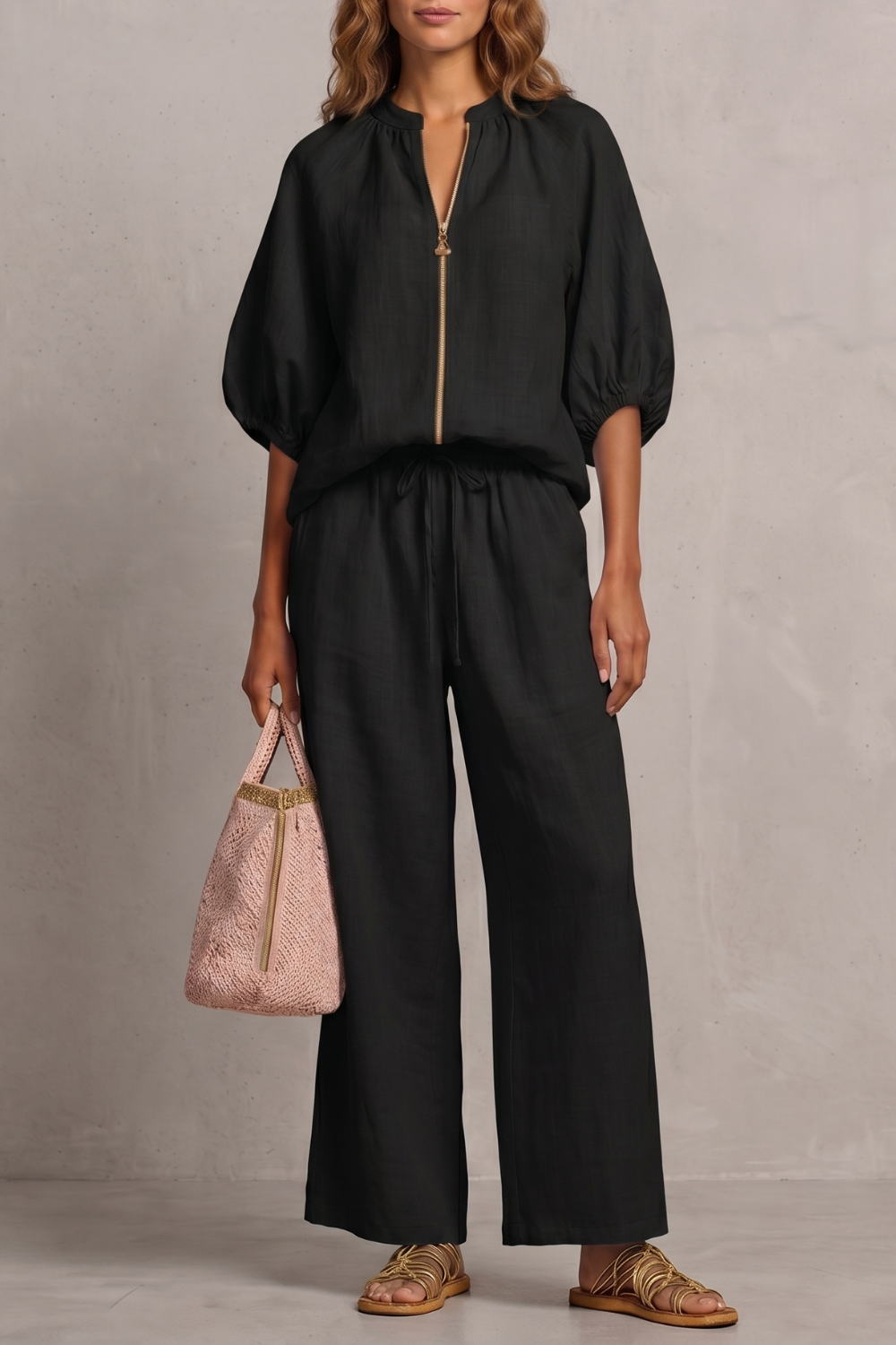 Gray colorway of the zip-front puff sleeve pants set, full-length view