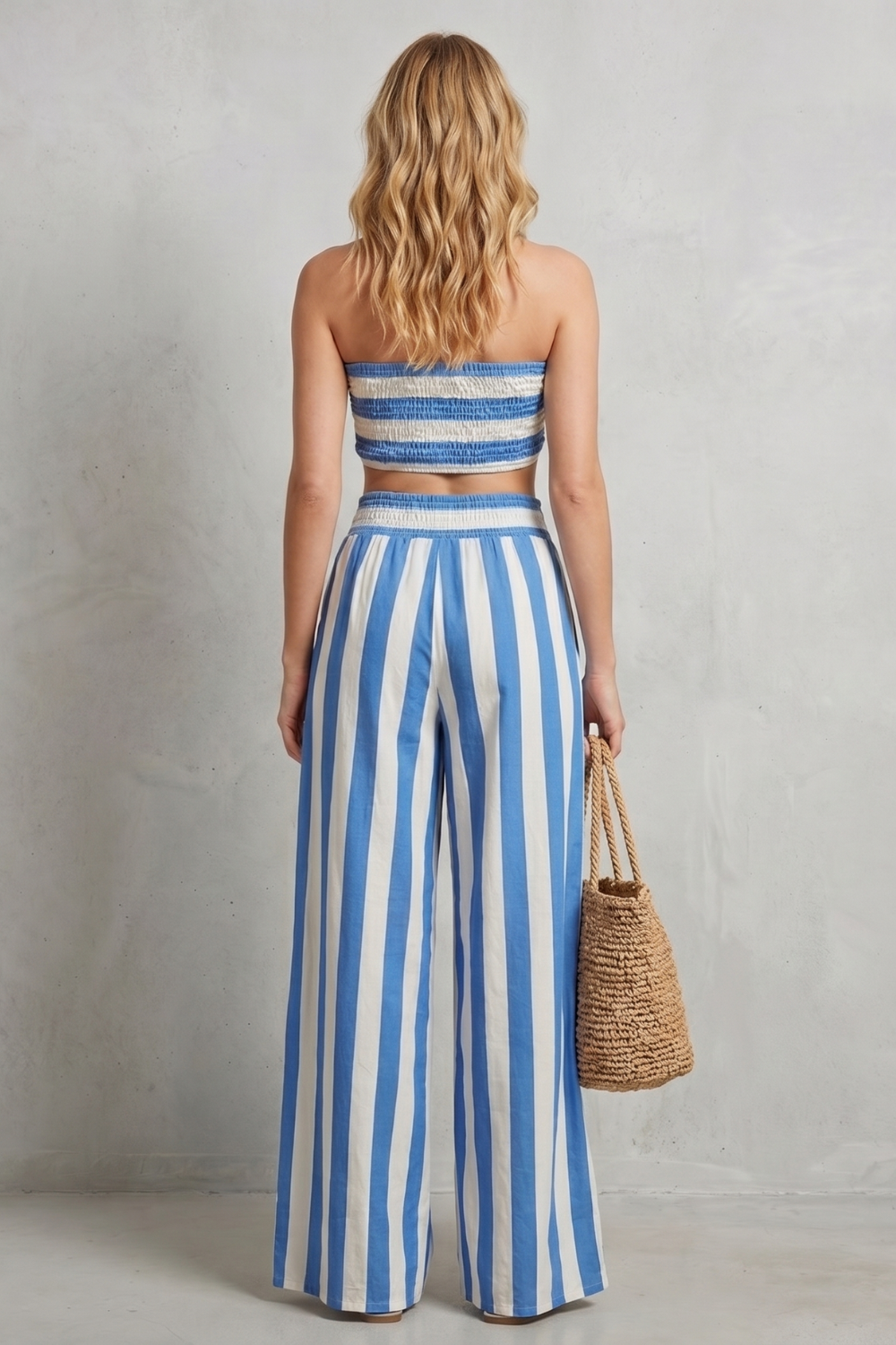 Blue stripe colorway of the bandeau top and pants set, full-length view