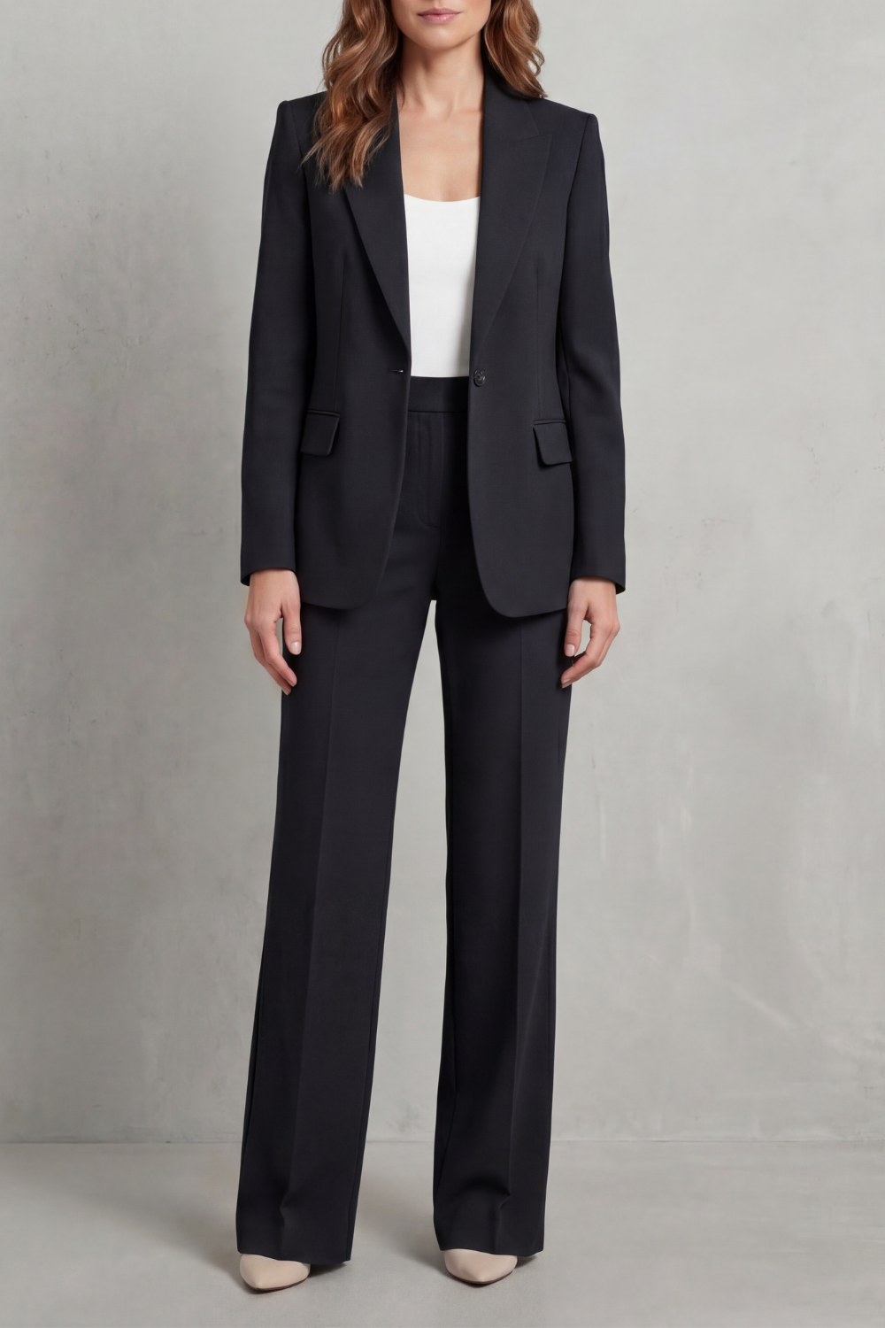 Power suit set styled with pumps and minimal jewelry for the office