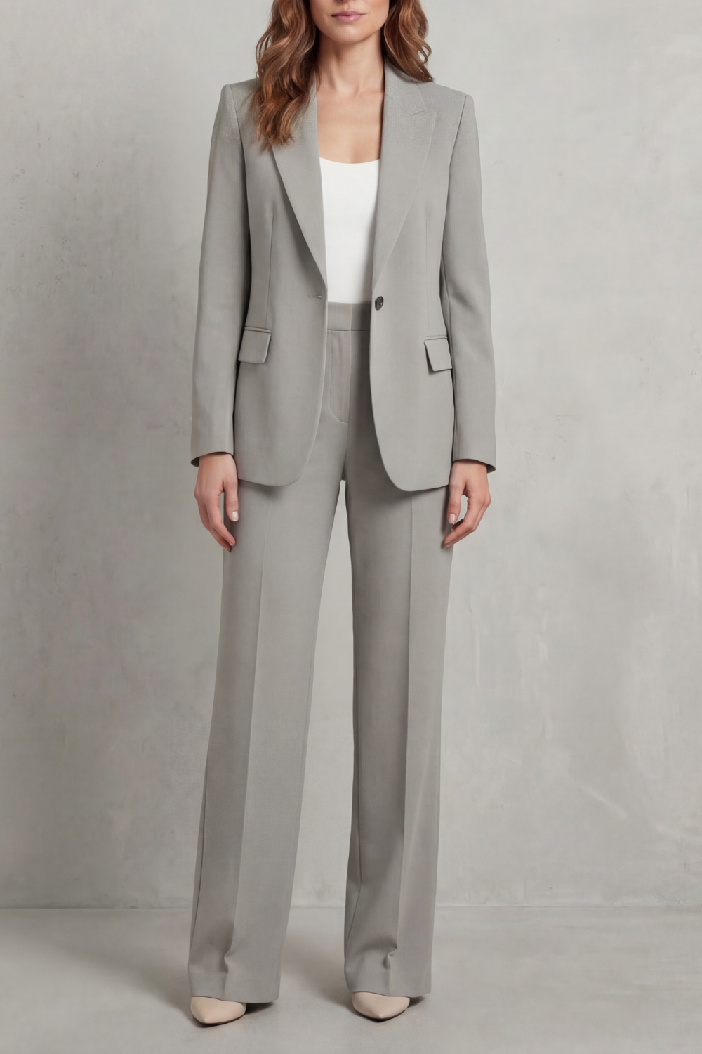 Close-up of the functional flap pockets on the structured blazer