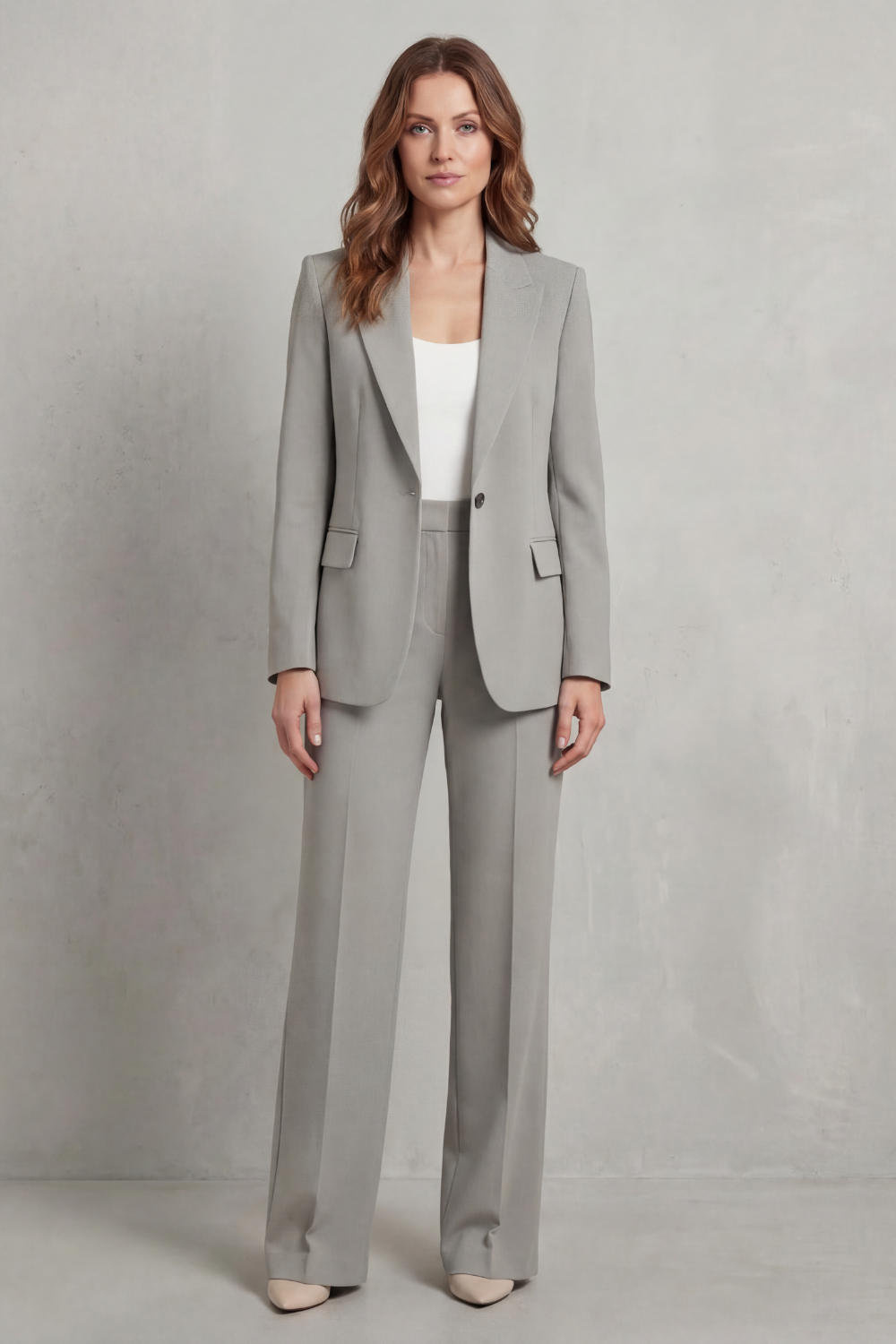Detail of the pressed creases on the straight-leg pants