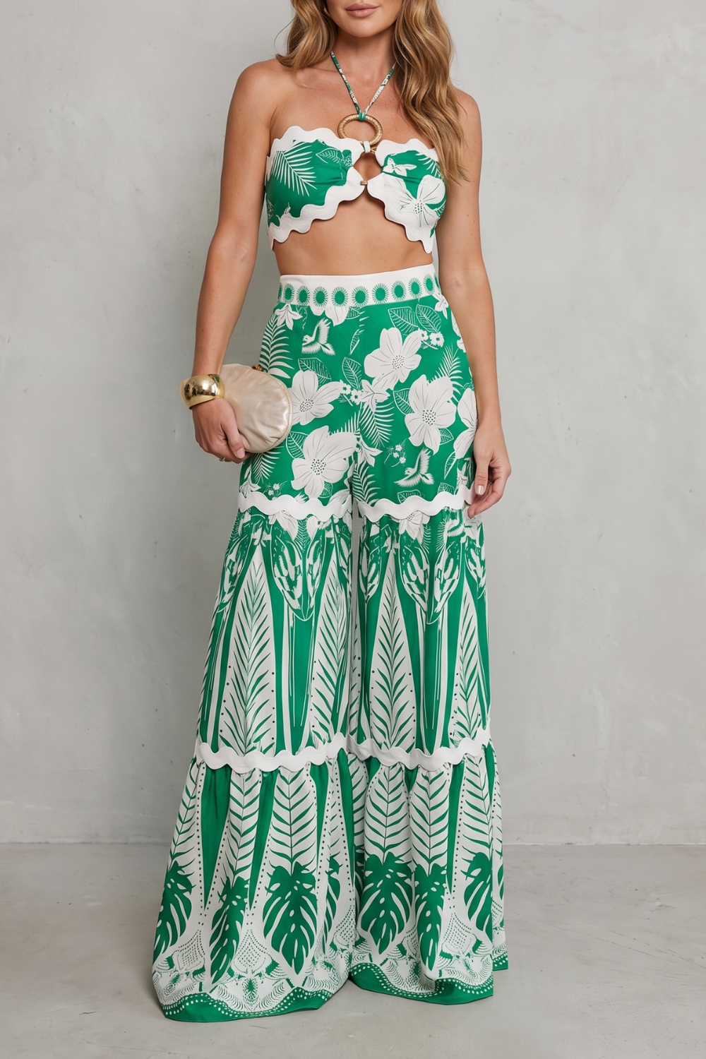 Women's halter crop top and wide-leg pants set in tropical print, front view