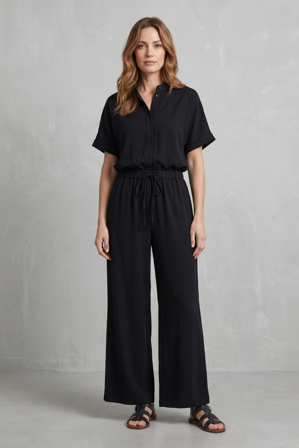Light Blue colorway of the short-sleeve top and pants set, full-length view