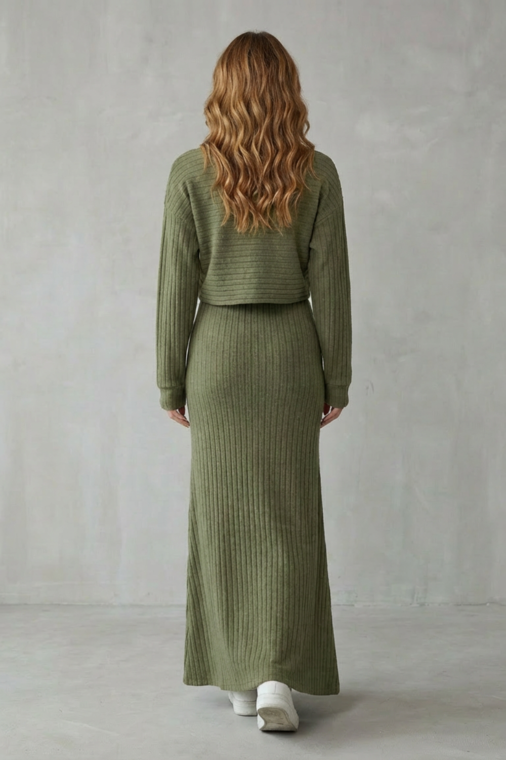 Detail close-up of the square neckline and ribbed knit texture