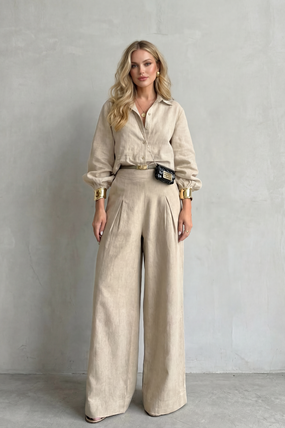 Side view of the khaki cropped shirt and high-waisted wide-leg pants