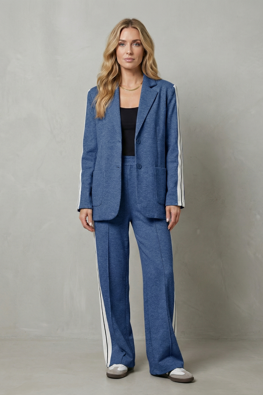 Close-up of the classic lapel and single-button blazer front