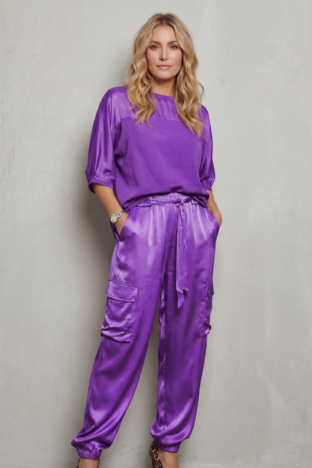 Apricot colorway of the satin cargo lounge set, full-length view