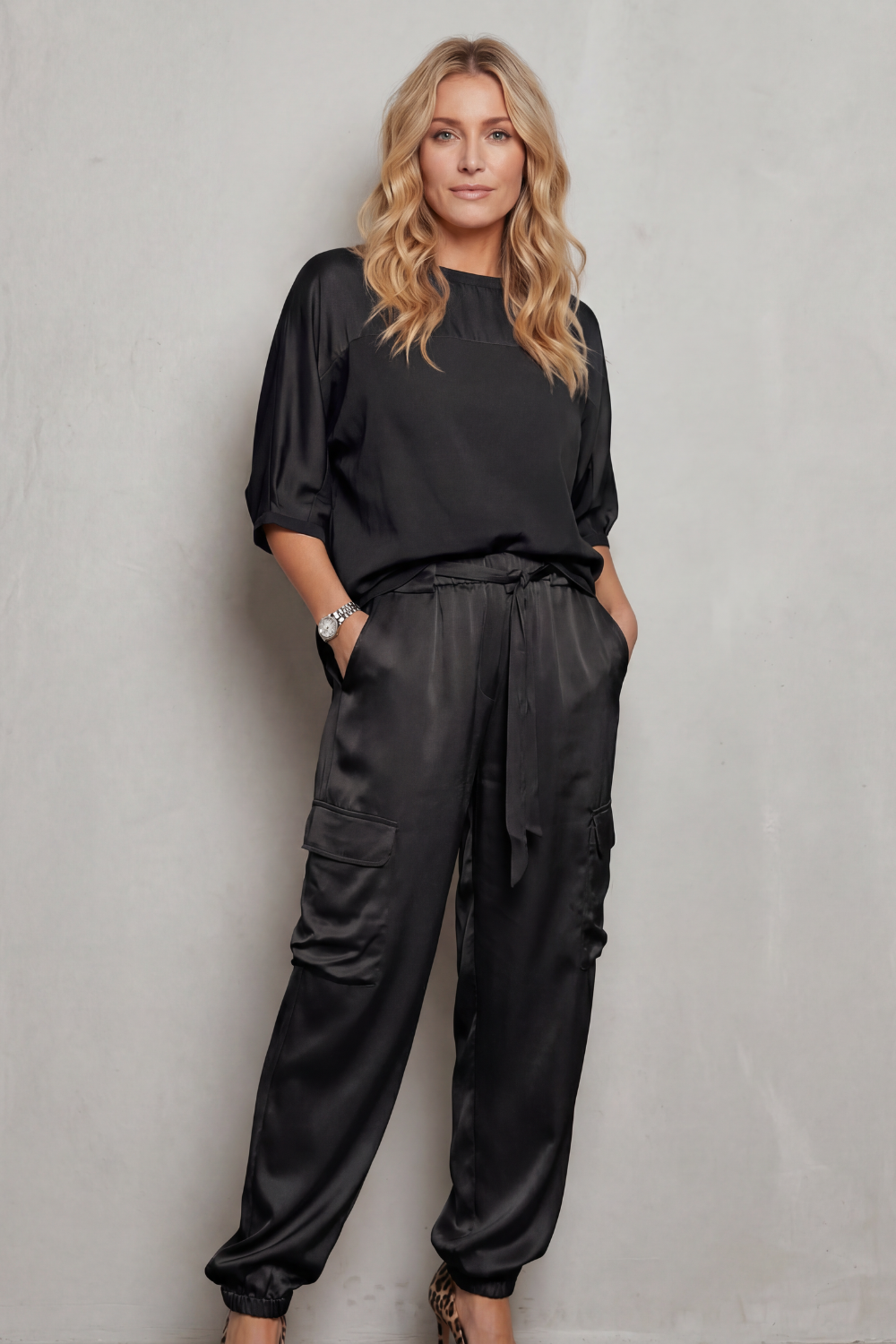 White colorway of the short-sleeve satin lounge set, full-length view