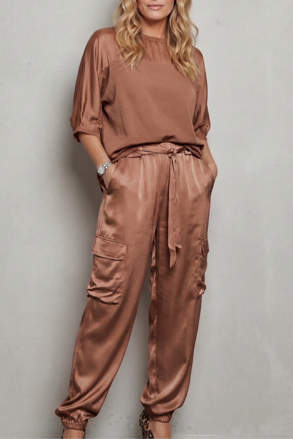 Blue colorway of the short-sleeve satin lounge set, full-length view
