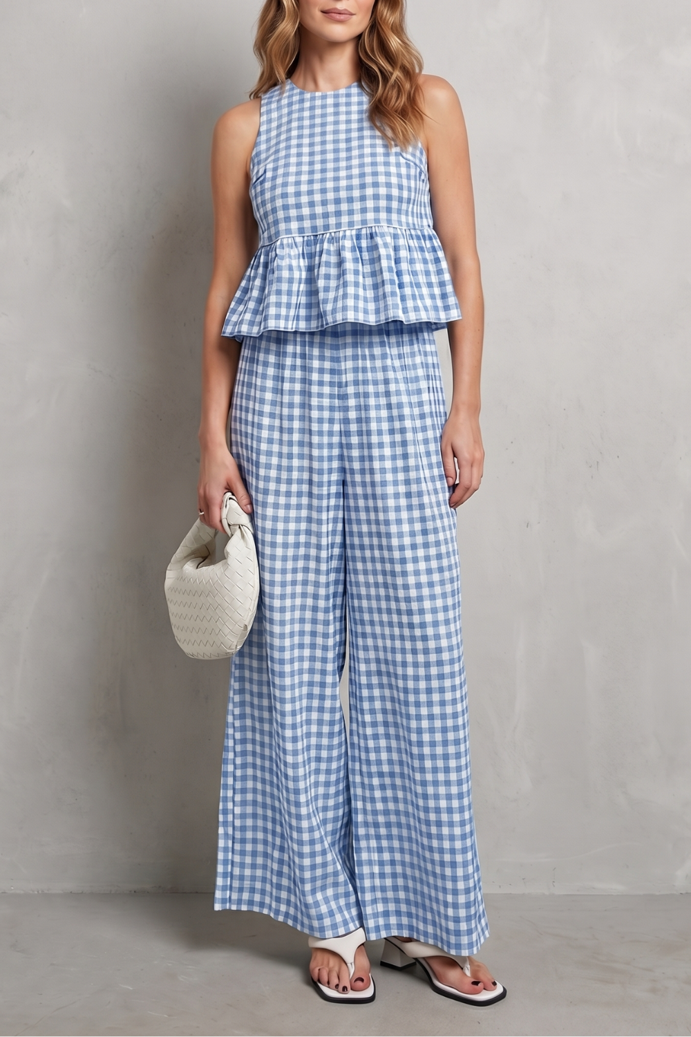 Detail of the high-waisted wide-leg pant in gingham check
