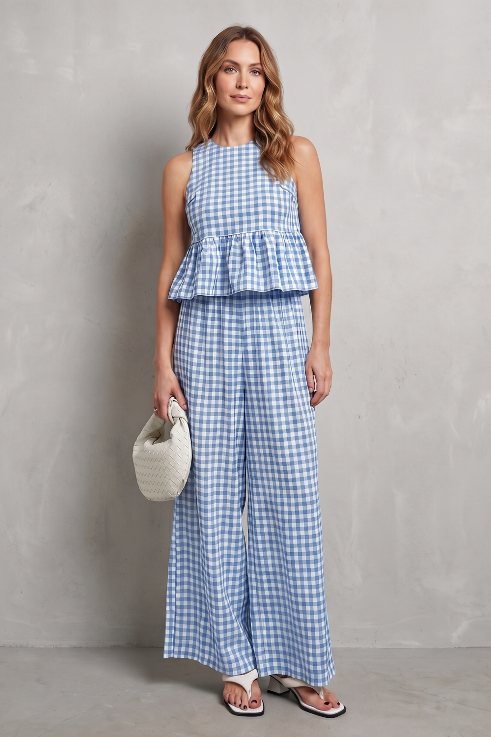 Set styled with minimalist sandals and statement sunglasses