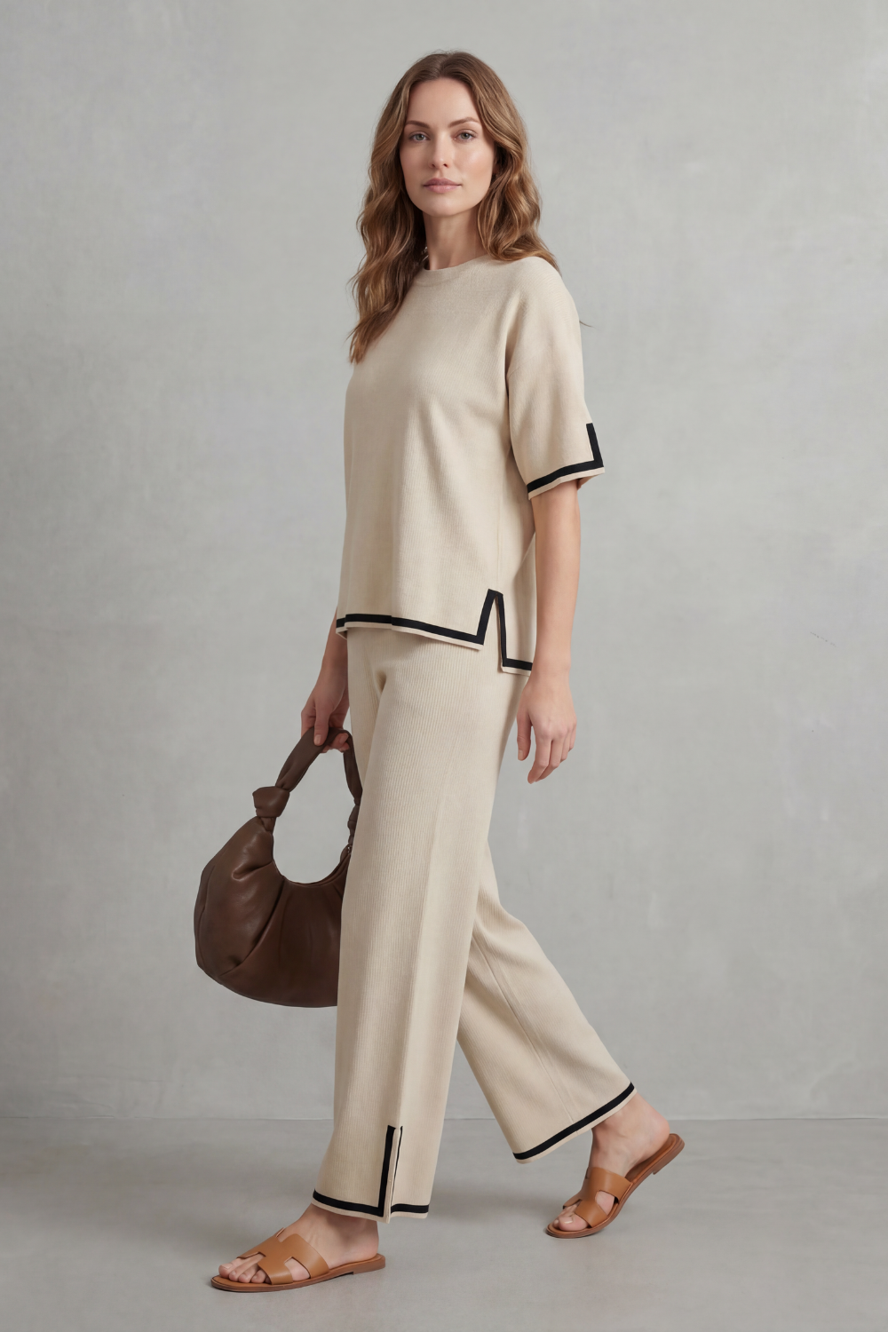 Back view of the contrast-trim rib-knit top and wide-leg pants set