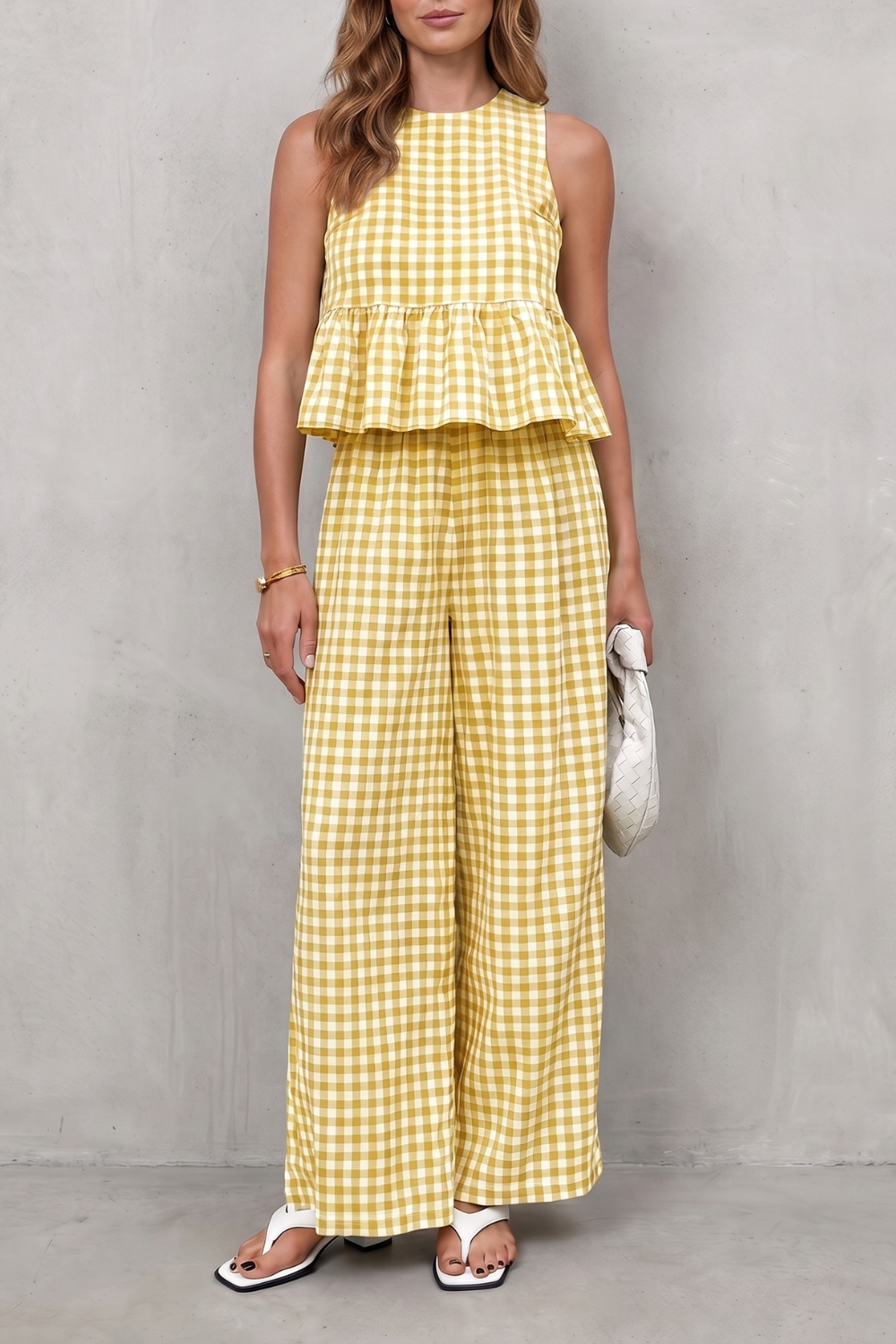 Gingham set styled with flat sandals and a woven handbag