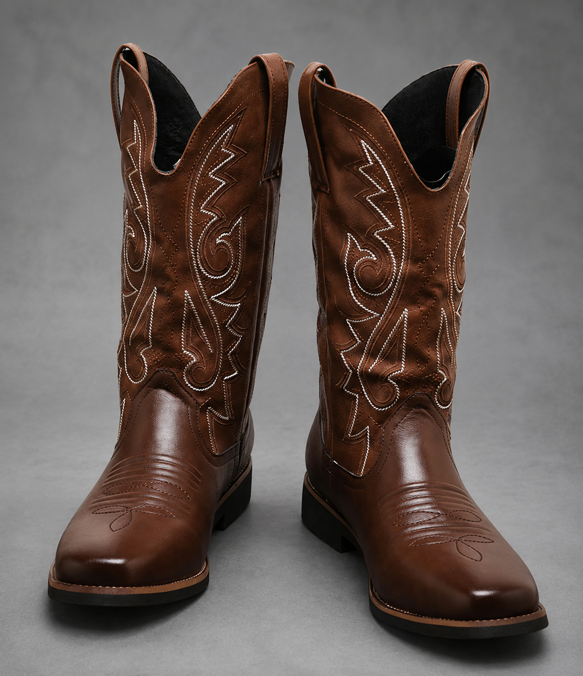 Men’s Western high-top pull-on boots with a microfiber leather-style upper, Chelsea-inspired silhouette and textured grip outsole.