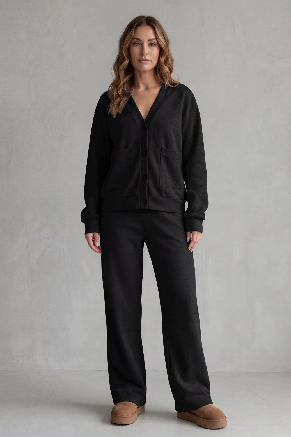 Detail of the patch pockets and soft-drape wide-leg pants