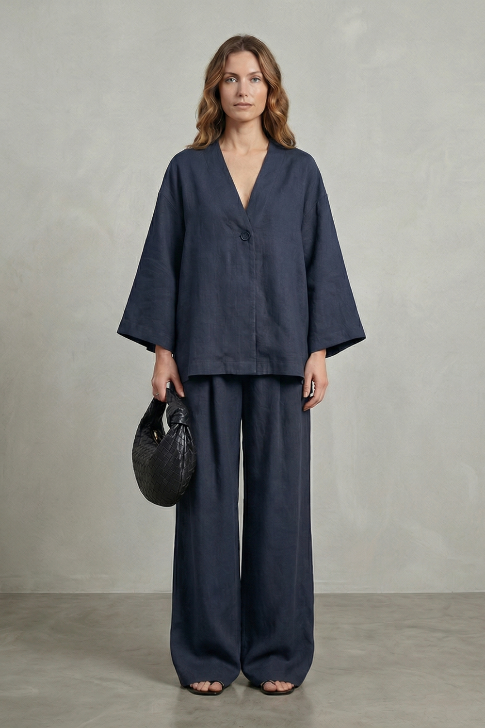 Apricot colorway of the wrap top and wide-leg pants set, full-length view