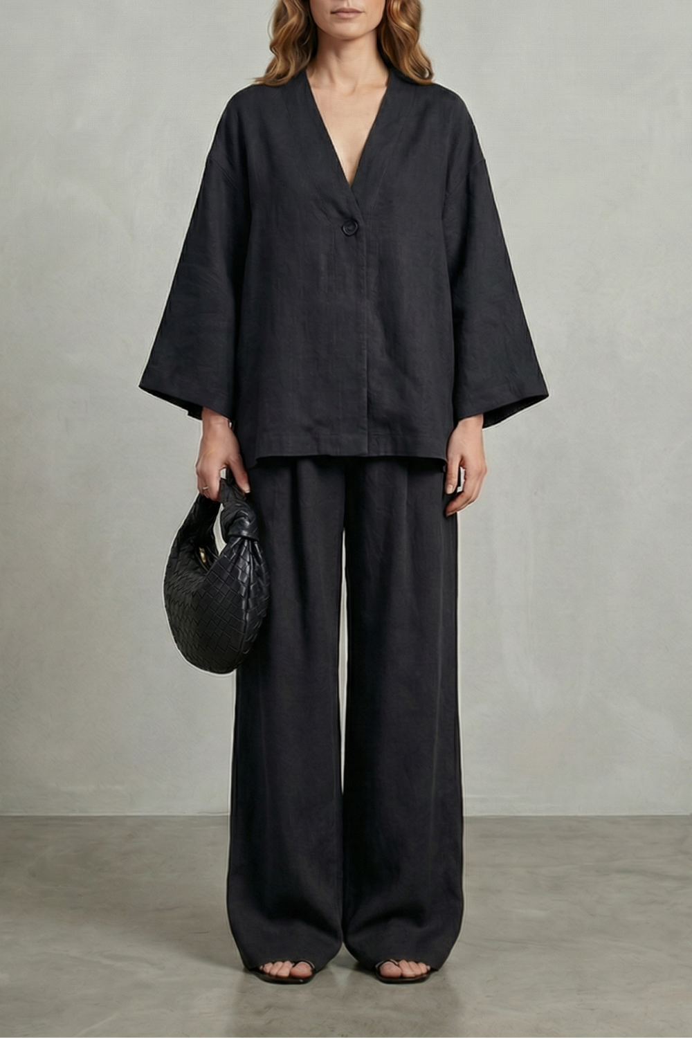 Beige colorway of the wrap top and wide-leg pants set, full-length view