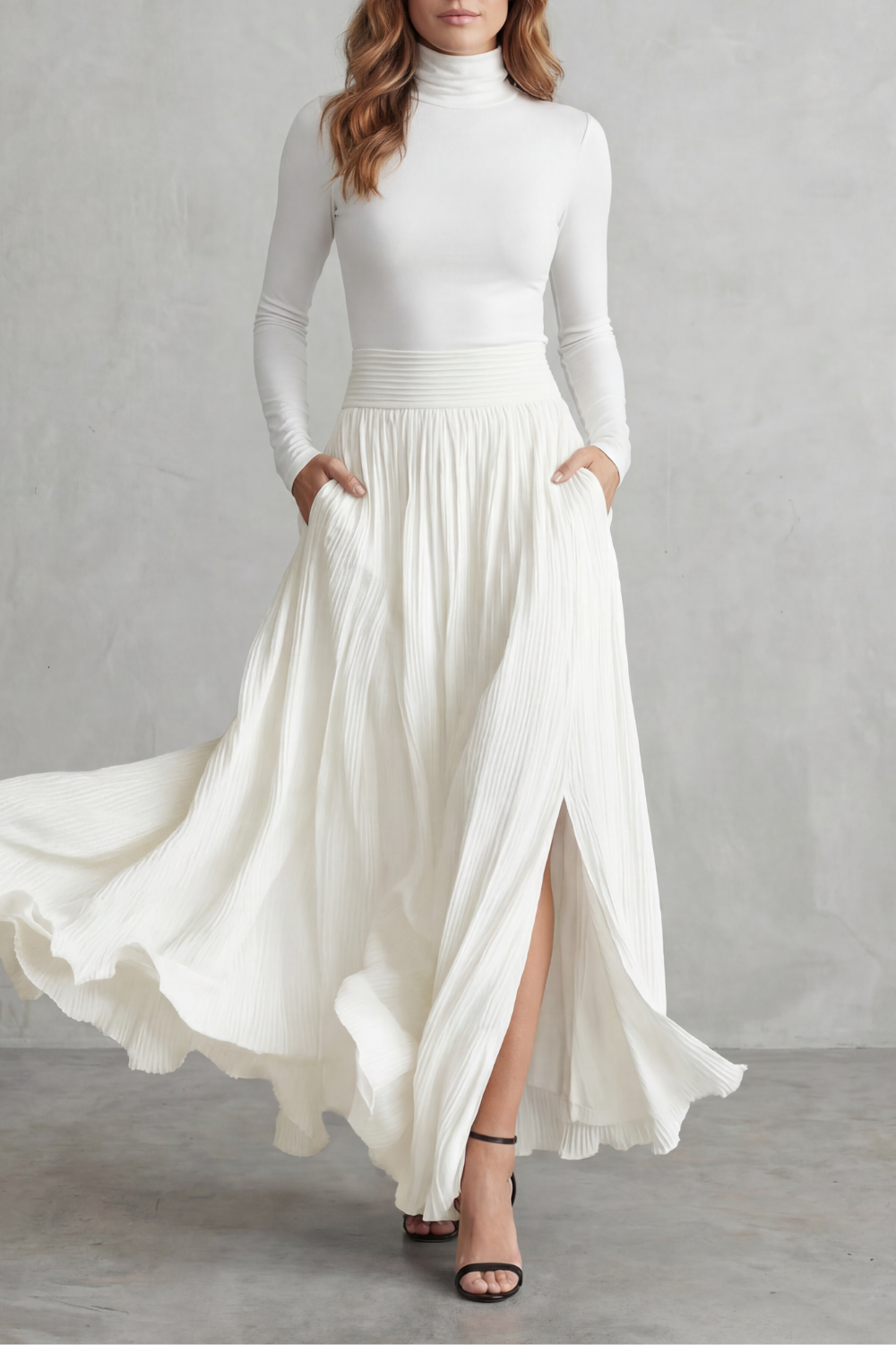 White colorway of the turtleneck and pleated maxi skirt set, full-length view