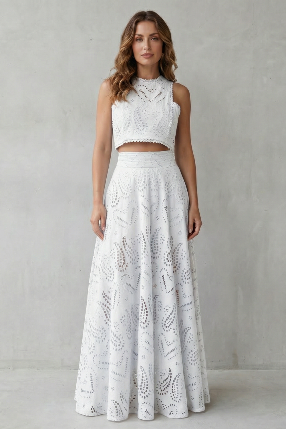 Black colorway of the lace crop top and midi skirt set, full-length view