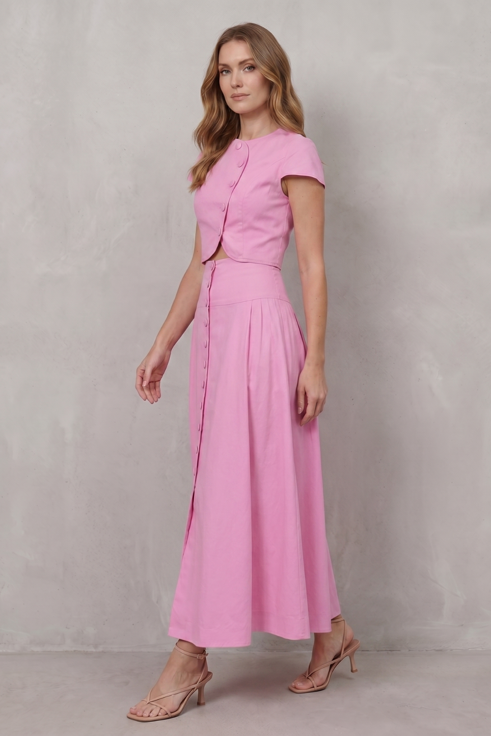 Back view of the pink two-piece maxi skirt set