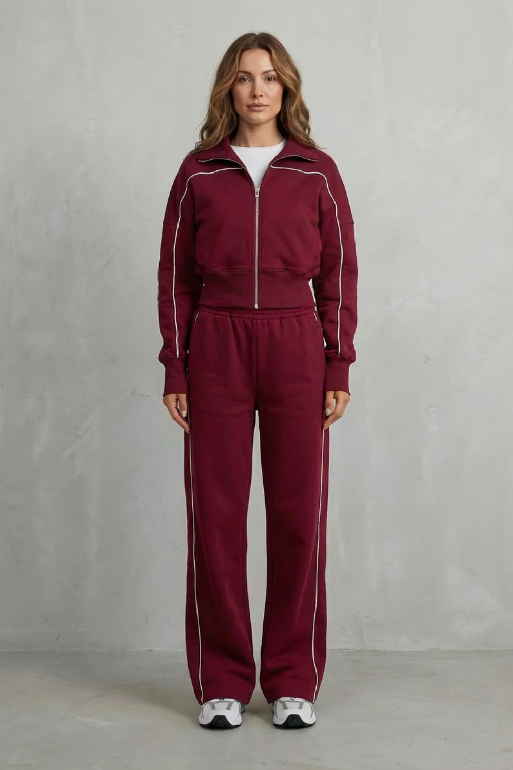 Black colorway of the piped zip-up jacket and wide-leg pants set