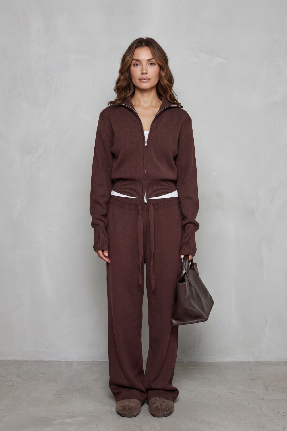 Side view of the high-neck knit cardigan and drawstring wide-leg pants