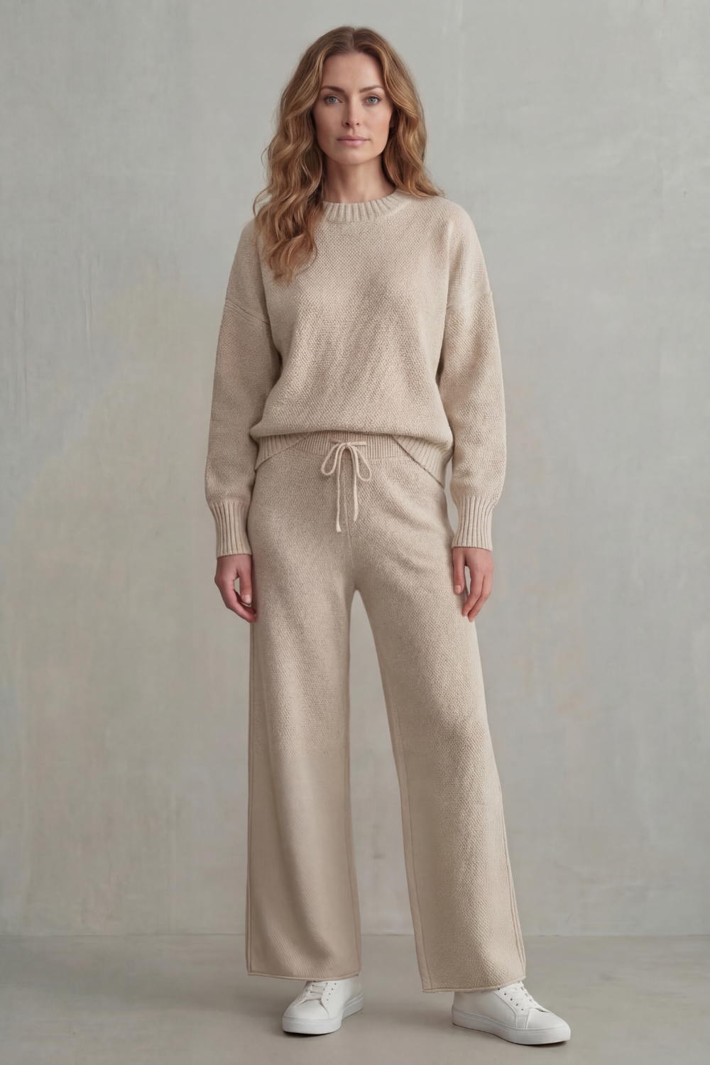 Black colorway of the drop-shoulder knit sweater and wide-leg pants