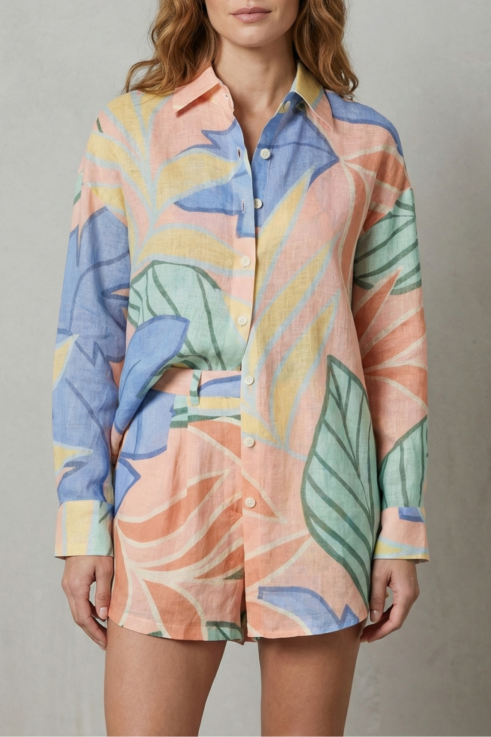 Women's tropical leaf print shirt and high-waisted shorts set, front view