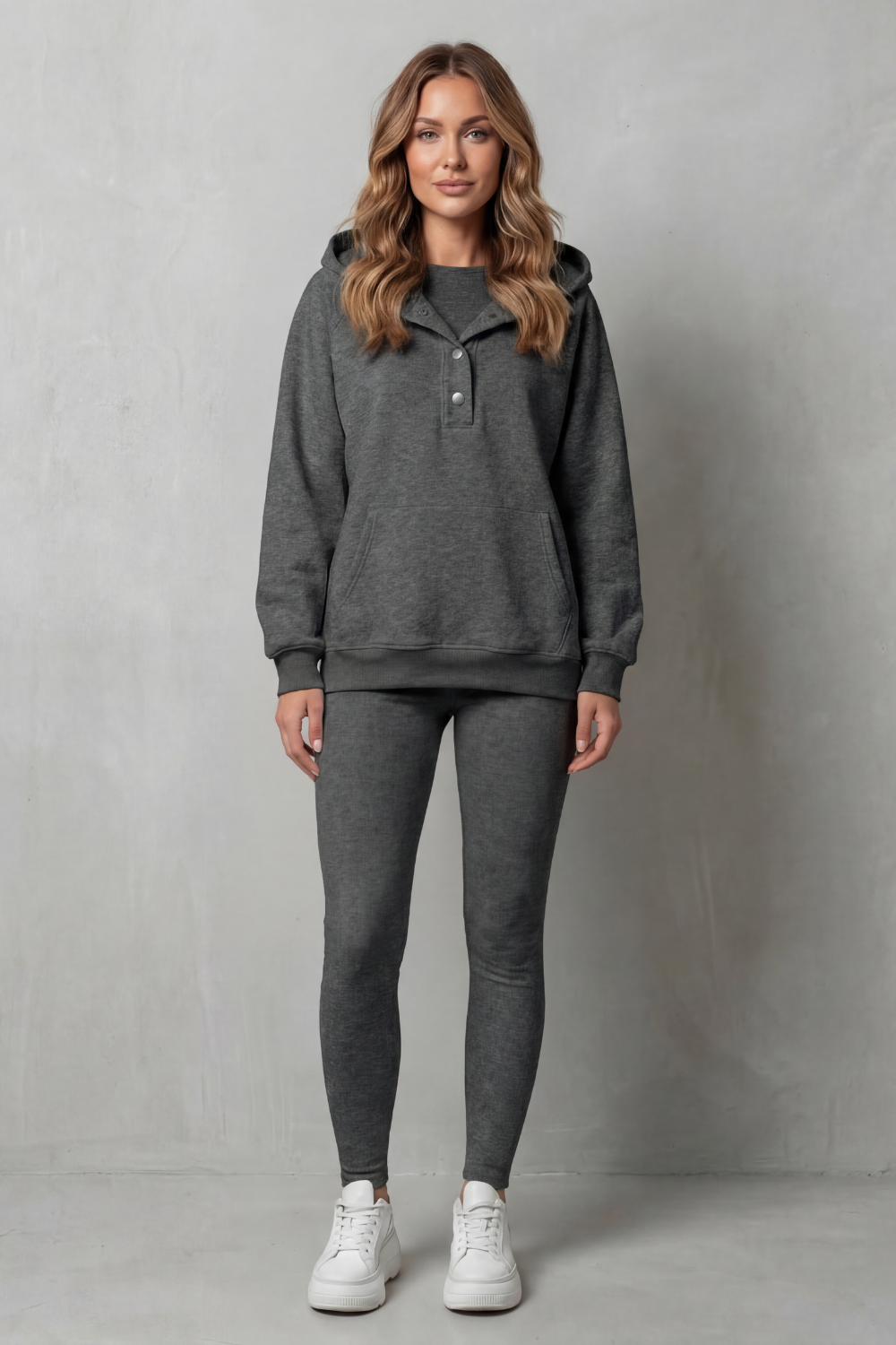 Close-up of the kangaroo pocket on the button-placket hoodie