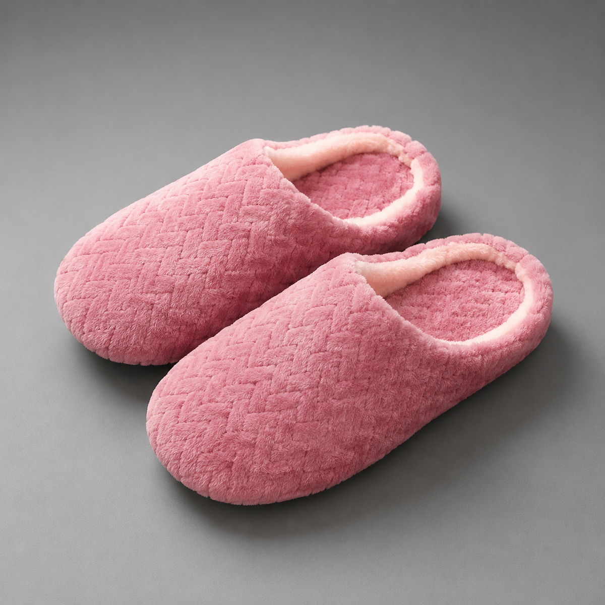 Unisex plush house slippers with a soft cloth upper, cozy lining, open-back slip-on design, cushioned sole, and non-slip outsole.