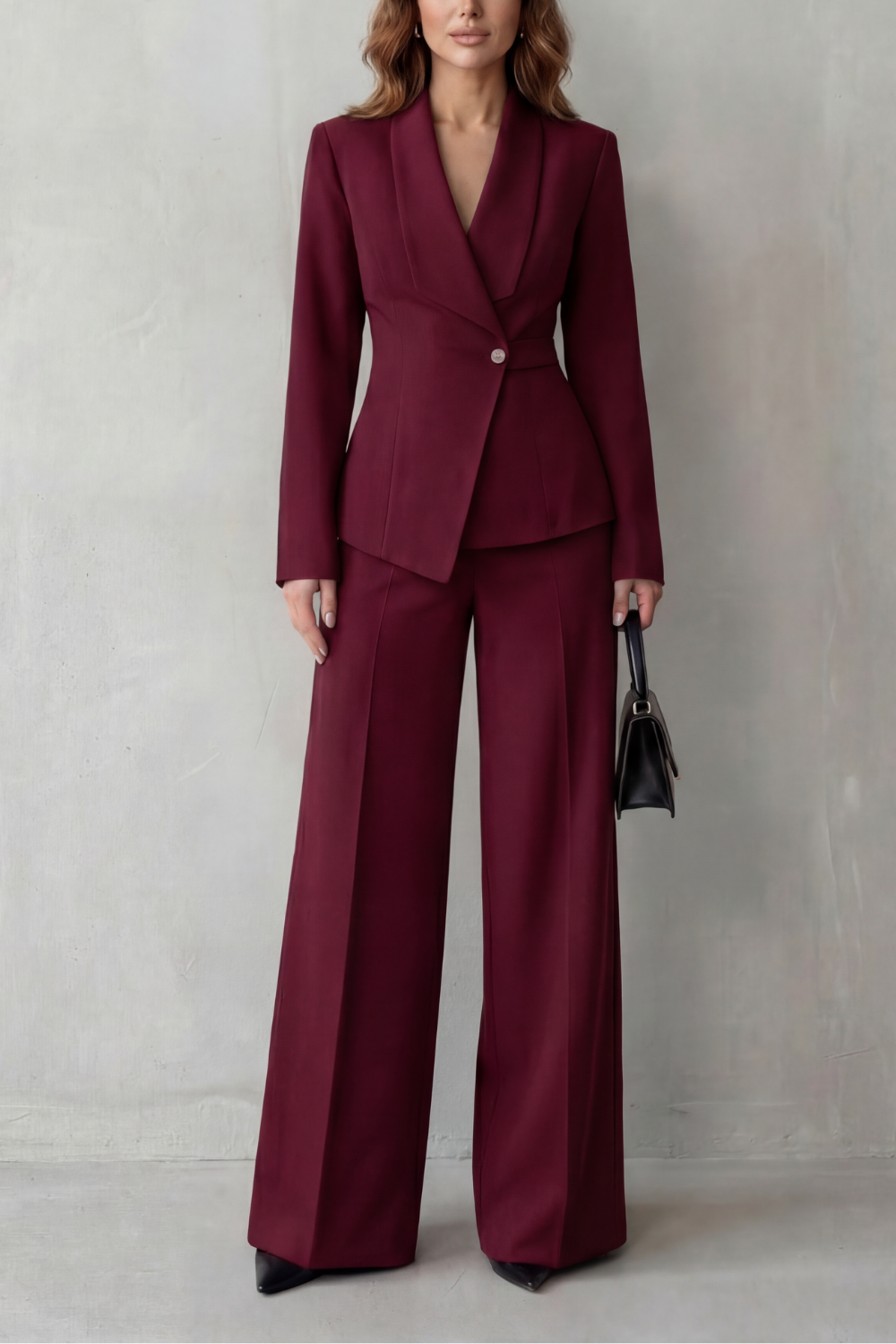 Suit set styled with pointed heels and a minimalist clutch