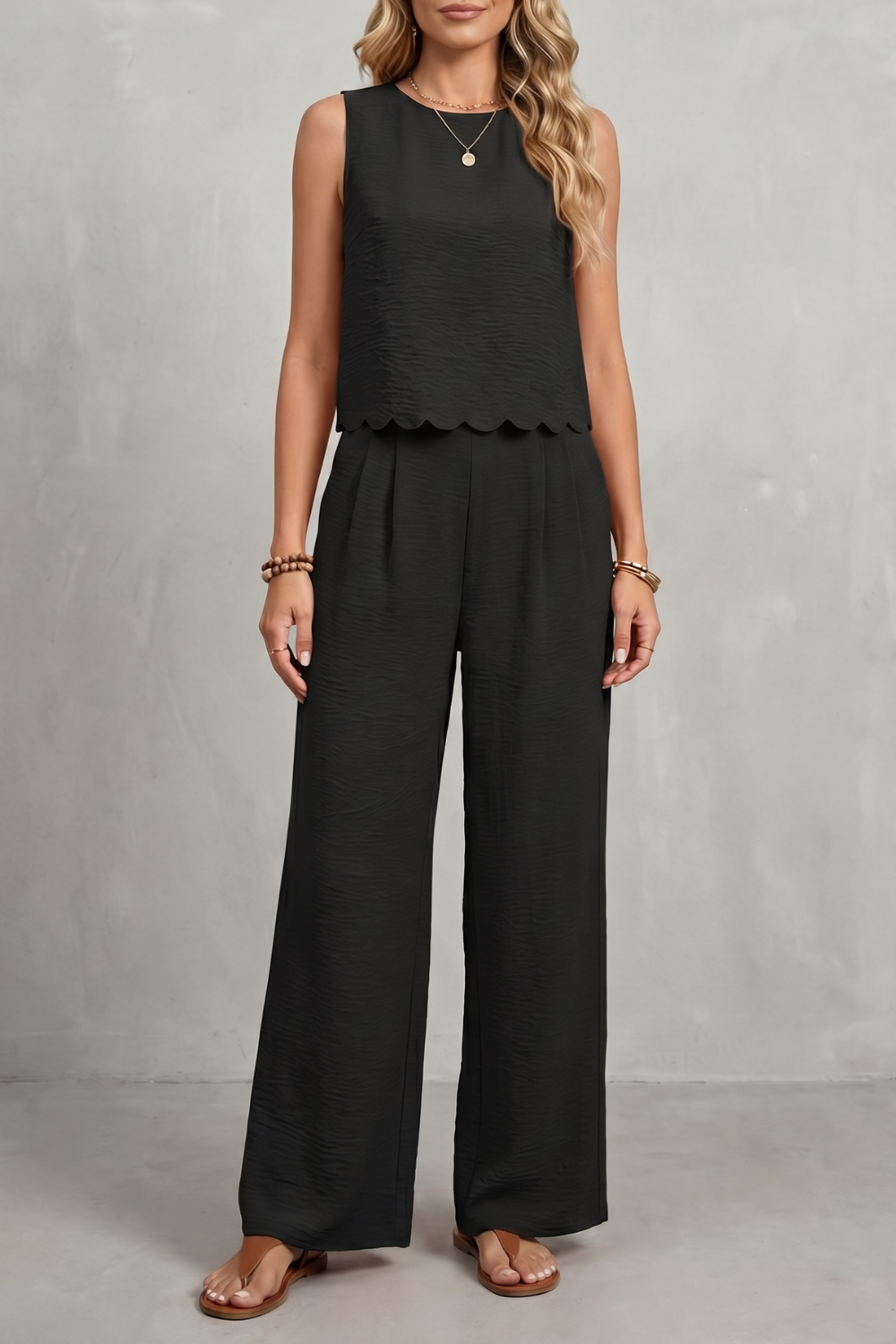 Women's open-back bow top and wide-leg pants set, front view