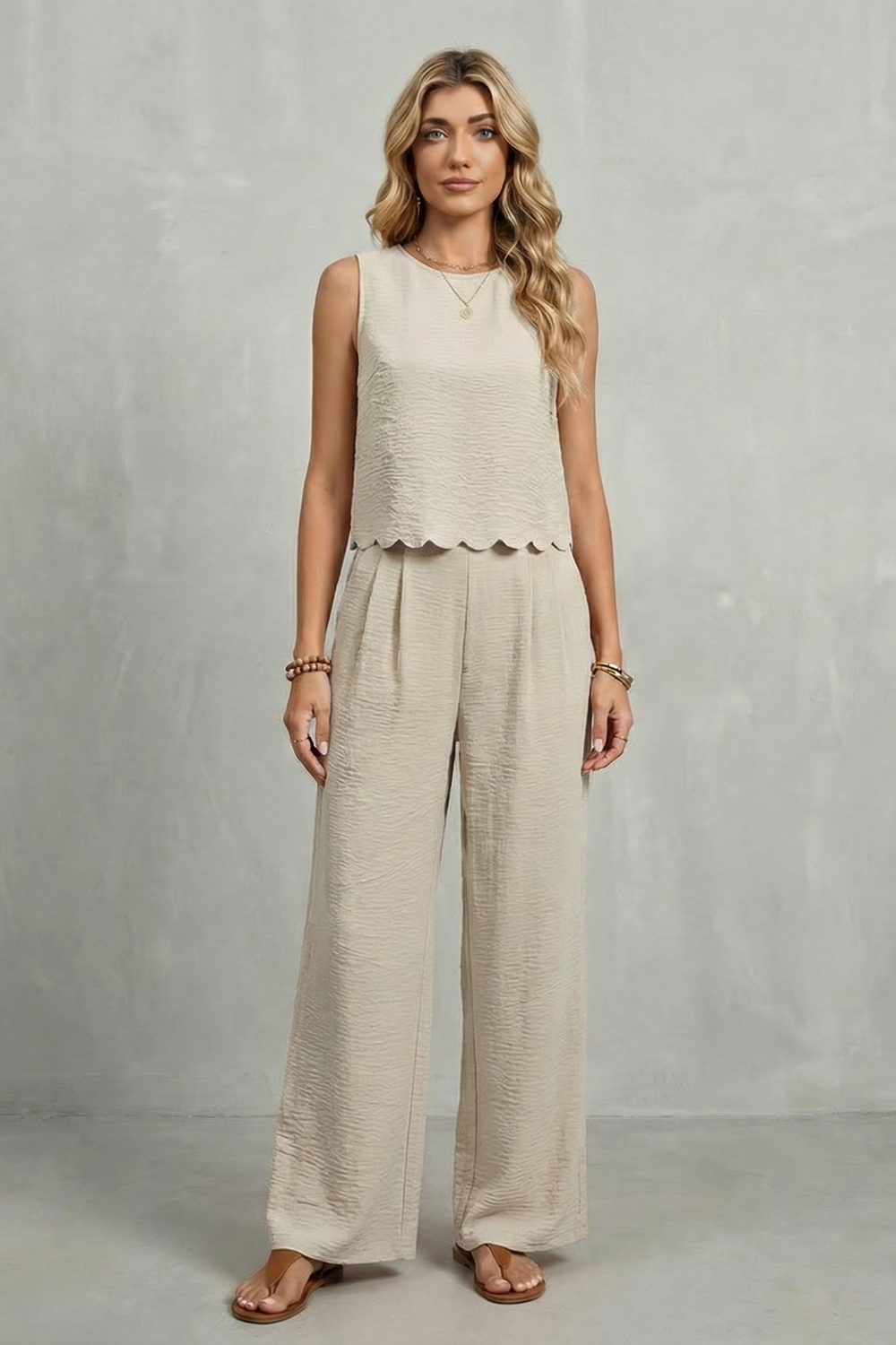 Beige colorway of the open-back set styled with minimal heels