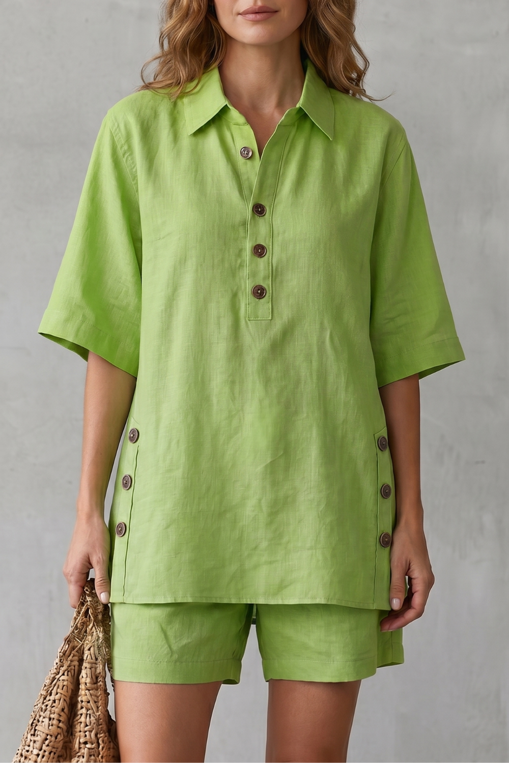 Detail of the button-front collar on the relaxed linen blend top