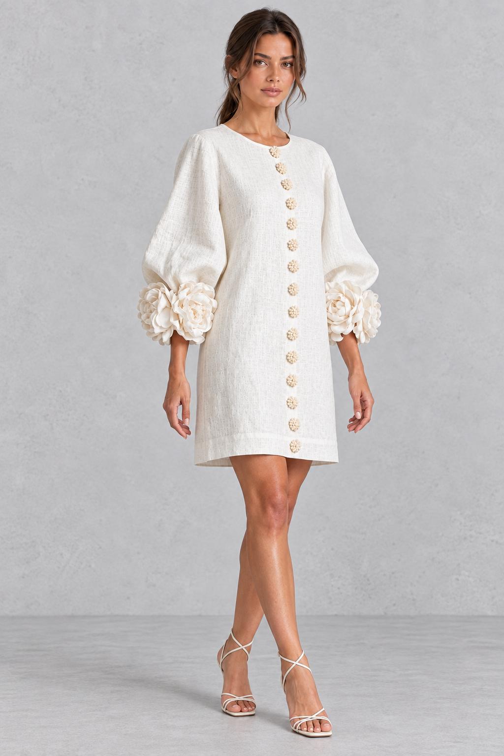 Lantern sleeve 3D floral mini dress laid flat to show the A-line shape.