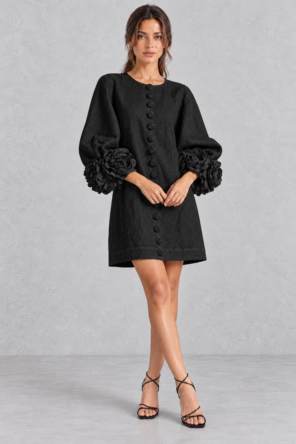 Side view of a loose A-line floral mini dress showing voluminous lantern sleeves.