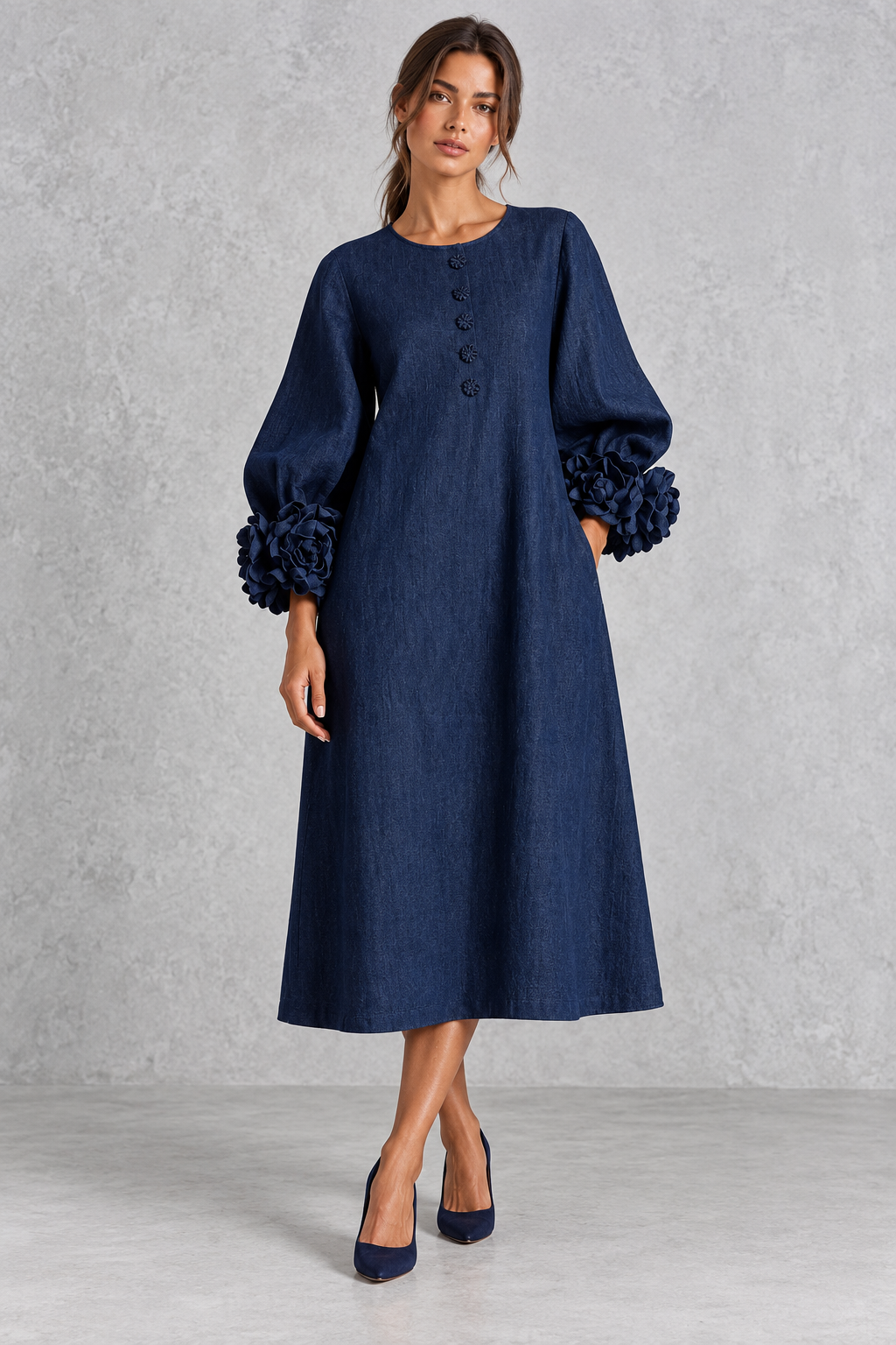 Woman wearing a 3D floral maxi dress with statement lantern sleeves and a round neckline, ideal for fall weddings and Thanksgiving.