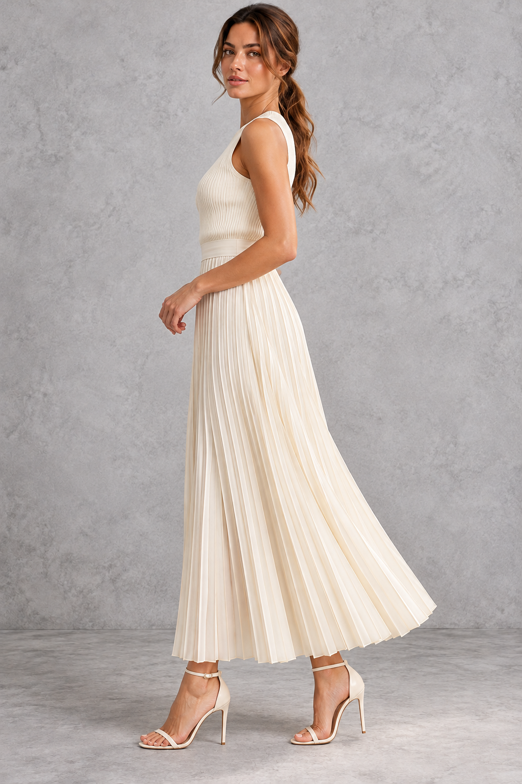 Side view showing the flowing pleats of the maxi skirt