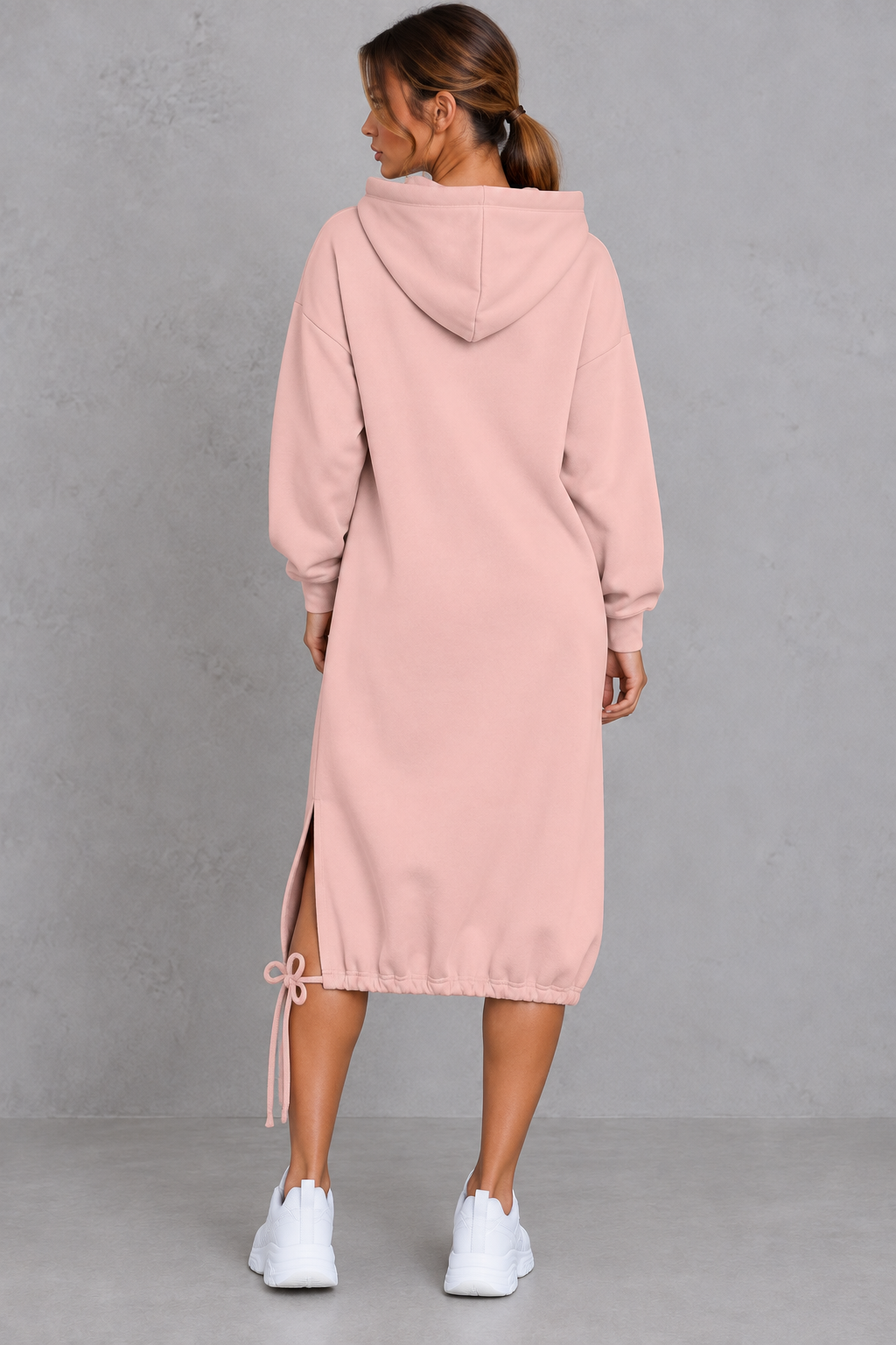 Back view of a women's hooded sweatshirt dress in midi length
