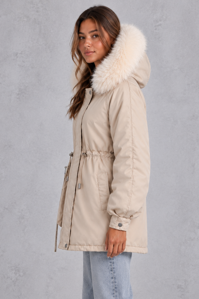 Back view showing the longer curved hem of the parka