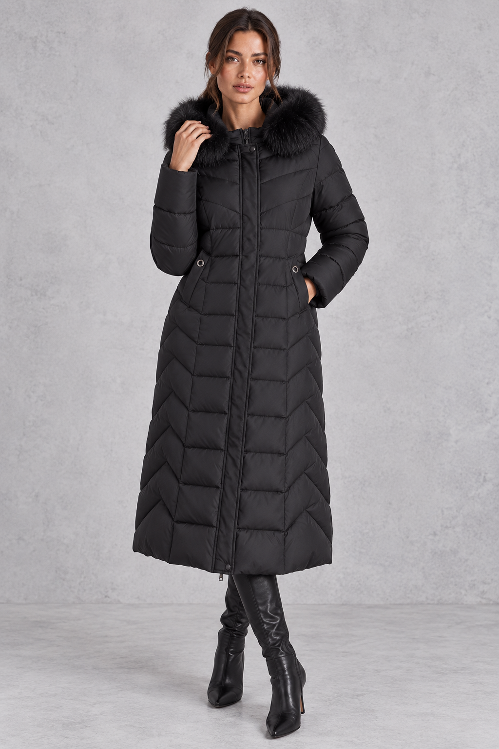 Women's longline chevron quilted puffer coat with faux fur hood, front view