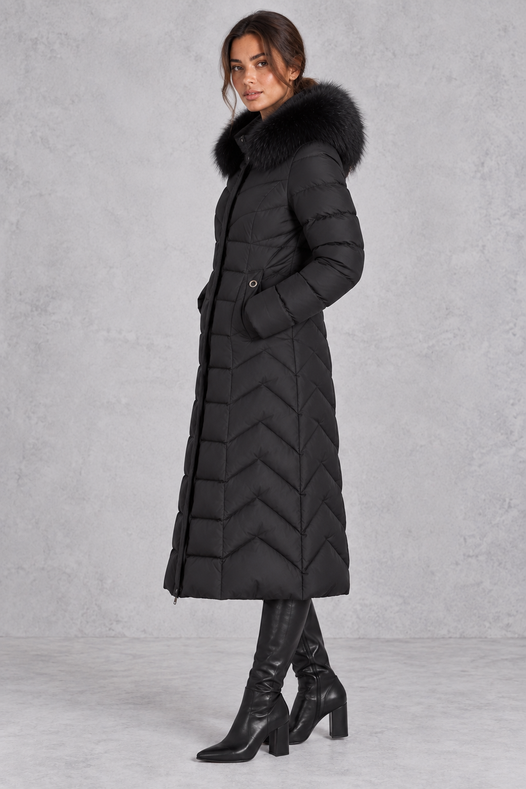 Back view of longline puffer coat showing chevron quilting